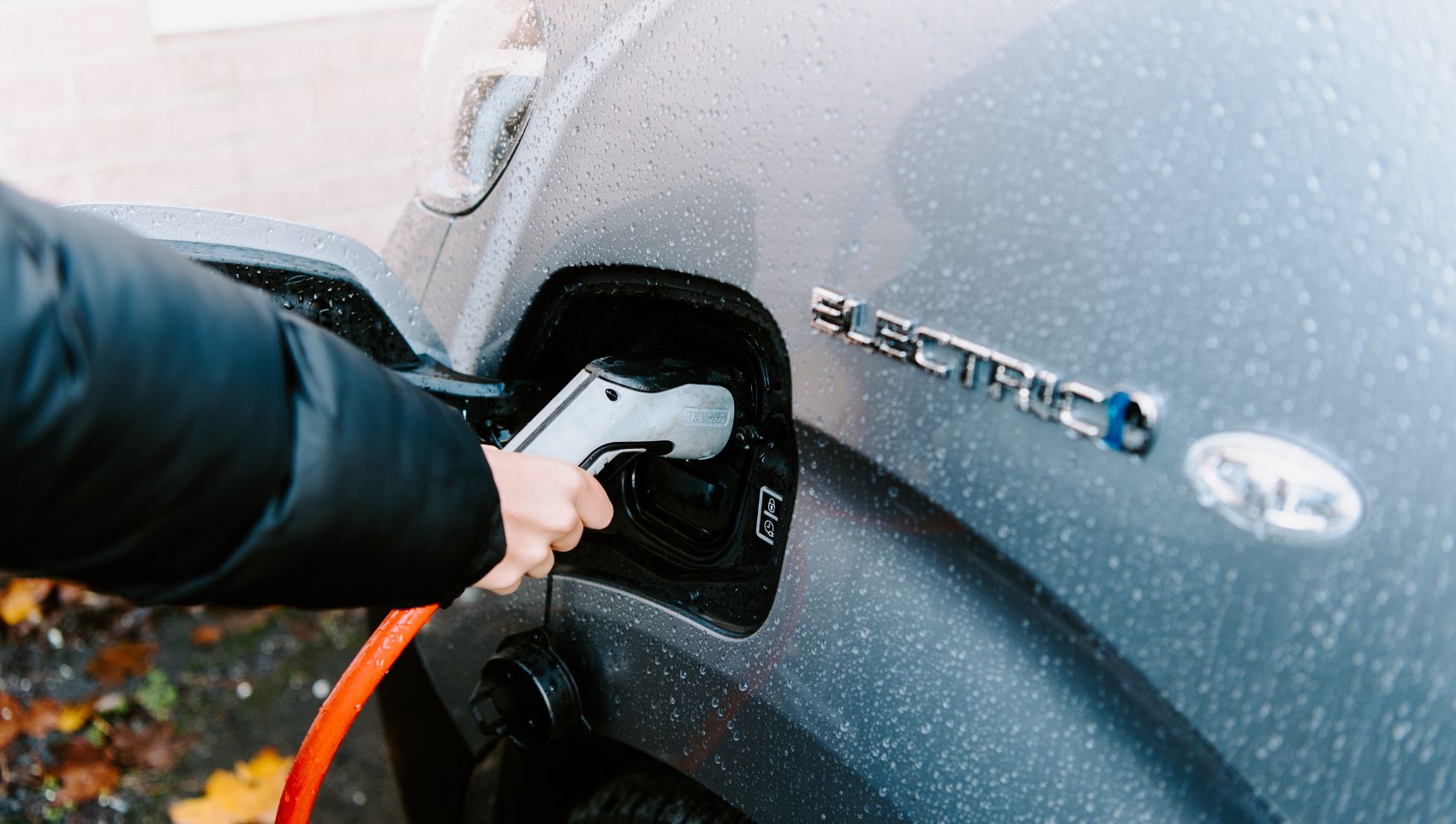 Electric vehicle being charged
